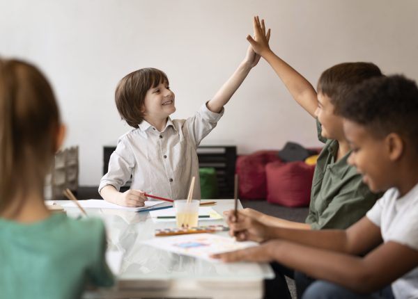 close-up-kids-drawing-together