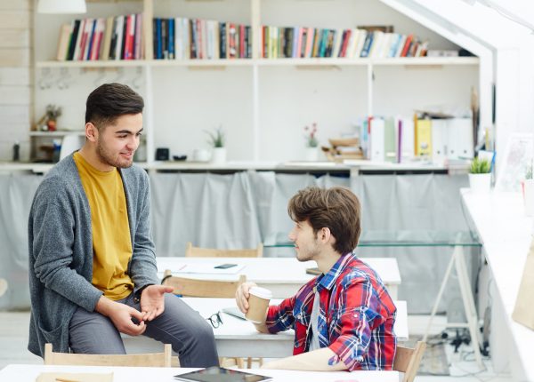 Clever guys discussing new ideas for design project